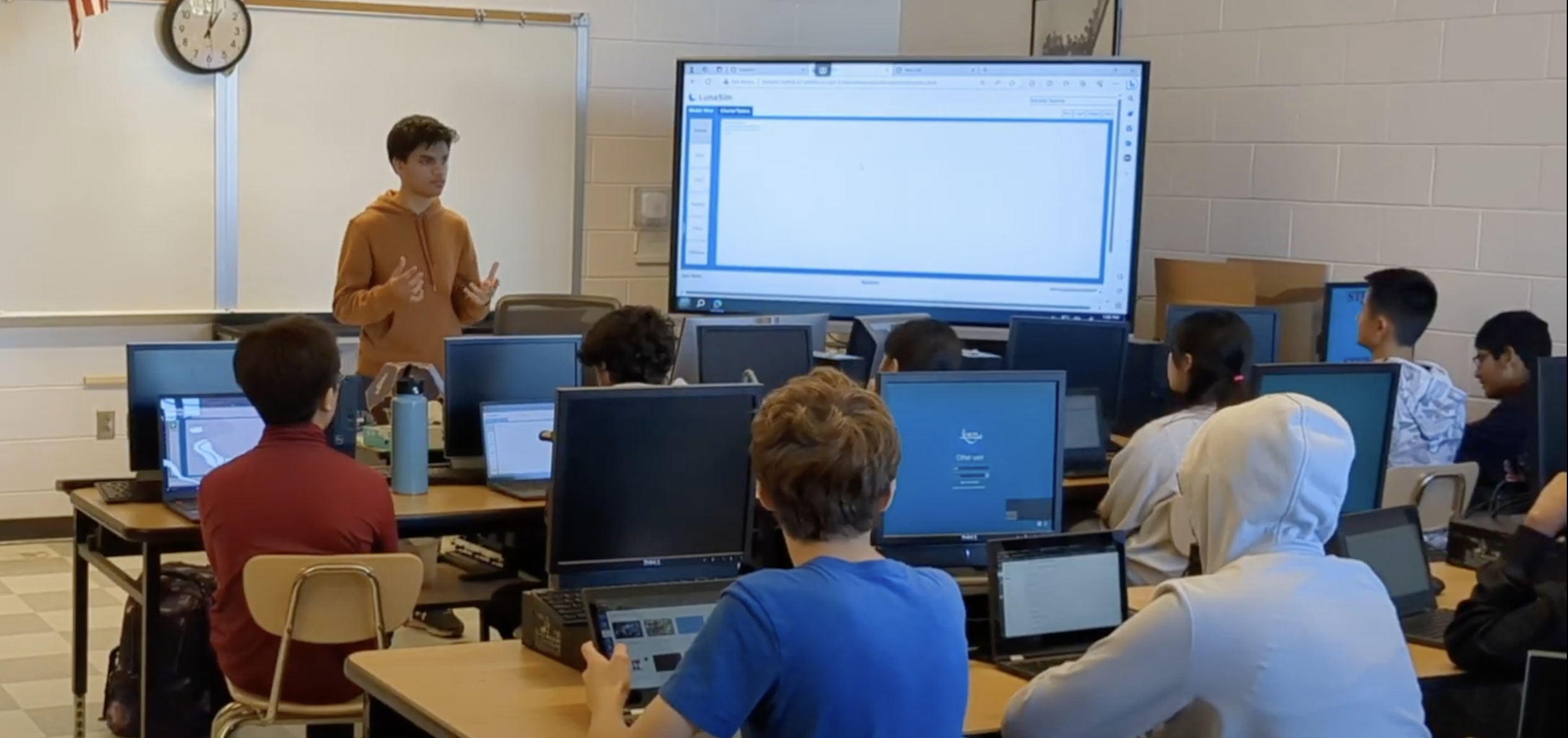 Photo of a class of students learning LunaSim